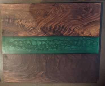 DARK WALNUT BURL BOARD WITH AN ALIGATOR FIGURED EPOXY RIVER