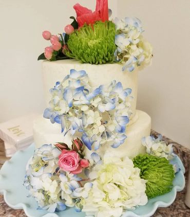 two tier wedding cake; fresh flowers