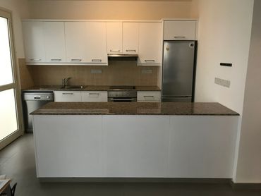 Hand Painted Kitchen in Peyia, Paphos. Painted with Benjamin Moore Paint.