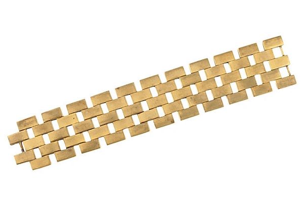 Art Deco brass bracelet with brick wall design, circa 1930. Made in France.