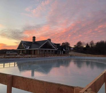 Horse Arena Fence turned skating rink in winter.