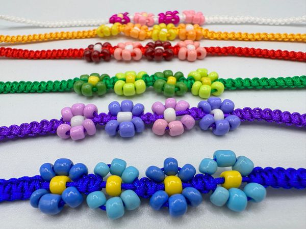 Colorful Handmade Bracelets Made Of Beads And Thread Stock Photo