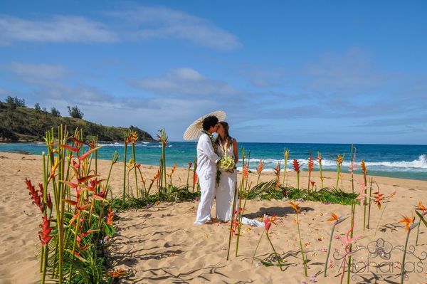 tropical flowers beach wedding decor