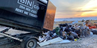 Disposing of trash at the dump