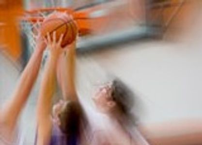Blurred image of player shooting the basketball
