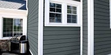 Blue siding from a new siding replacement from Butler County Construction.