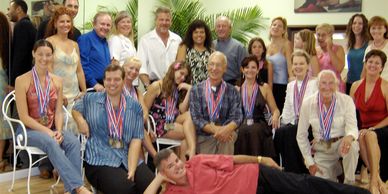 Ballroom and Latin dance Lessons Theo and Ganine-U.S. Champions Top teachers-20 students wear medals