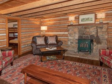Main Cabin living room with fireplace