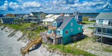 Aerial drone showing beach and vacation rental