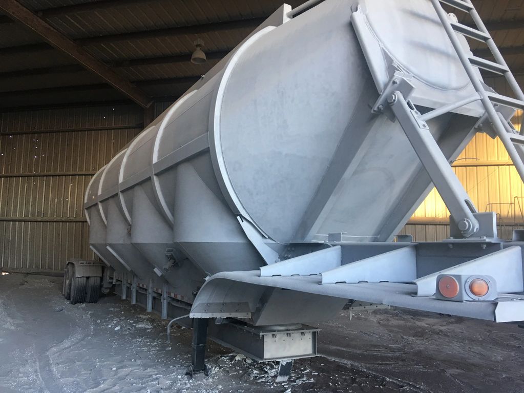 Sand blasting aluminum tankers 