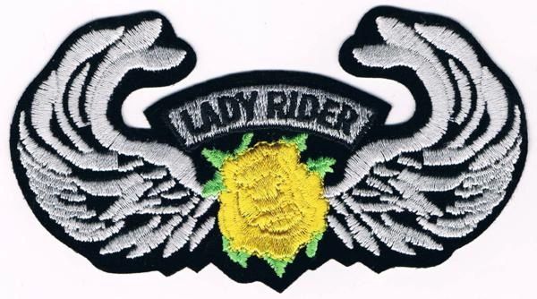 LADY RIDER WITH YELLOW ROSE/WINGS
