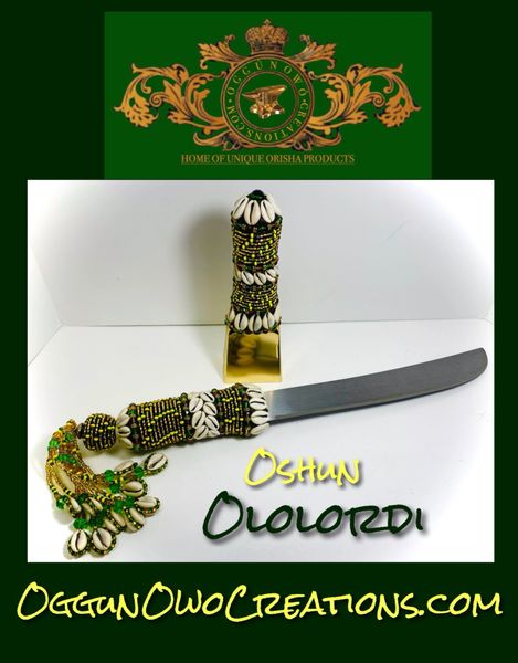 Machete and cencerro (cowbell)For Oshun Ololordi