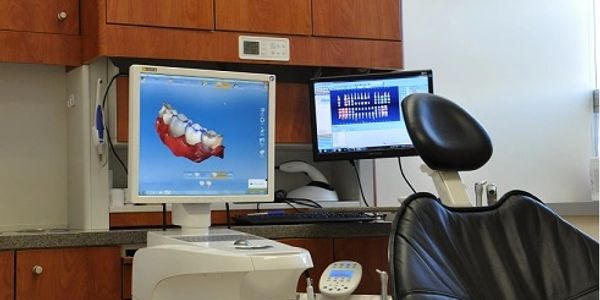 dentist wilmington CEREC one visit crown implants CBCT dentures extraction root canal whitening 