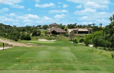 Comanche Trace clubhouse and golf course view