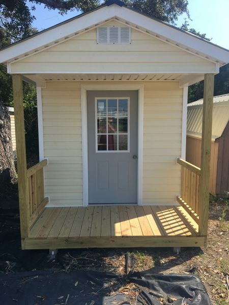 8x8 Vinyl Cream/Black Roof with porch OutDoor UpGrades