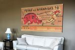 Vintage Arkansas Razorbacks football ticket canvas art from Row One Brand, a vintage sports brand.