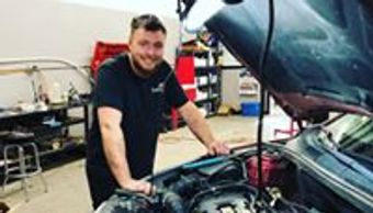 Tech 7 Auto Journeyman Mechanic Shawn Rindero goes under the hood for engine repair in Saskatoon.