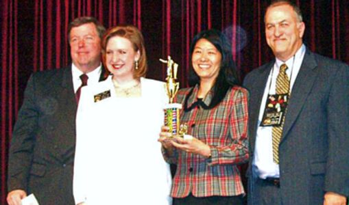 DR. HATTIE LIU RECEIVING AWARD AT THE TOASTMASTERS DIVISION CONTEST IN 2006.

Ph.D  - Georgia Tech