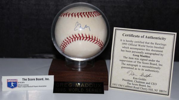 Greg Maddux Autographed 1995 World Series Baseball, The Score Board, Inc. Certified