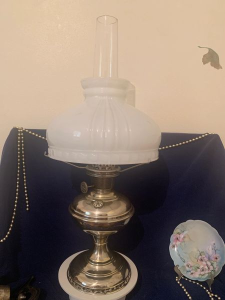 Aladdin Model No 6 Nickle Plated Oil Table Lamp with a Milk Glass Shade and Heelless Chimney