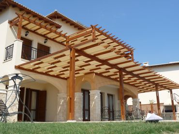 Two Pergolas with pergola shade/pergola cover made with shade cloth fabric weave by Shadeports Plus.
