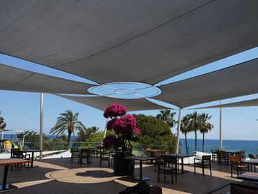 Large outdoor shade sails providing sun shade and patio shade by Shadeports Plus Cyprus.