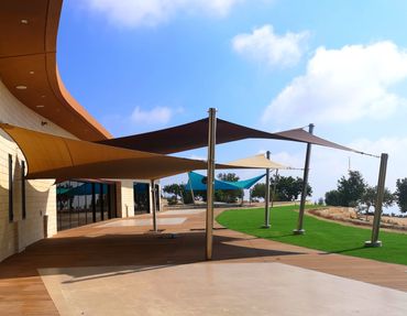 Two outdoor shade sails providing sun shade and patio shade by Shadeports Plus Cyprus.