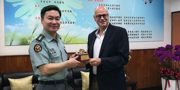 Presented with an award in Taiwan