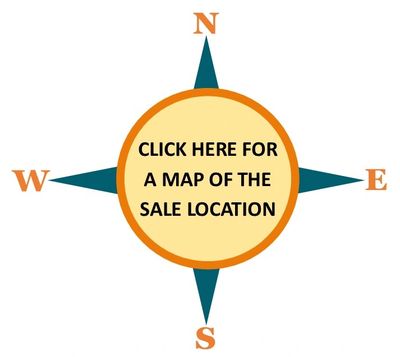 Compass graphic with clickable map location text.