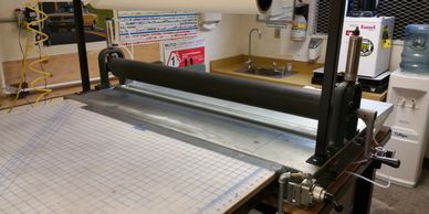 The application rollers come in all sizes.  We use a 48" roller.  We got ours from WWW.highwayhandym