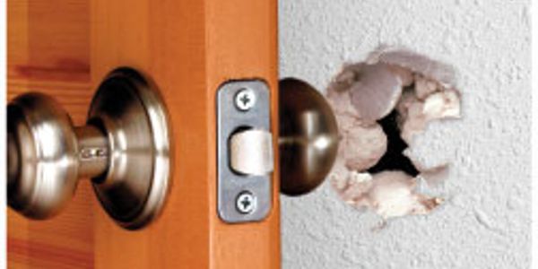 Staten Island doorknob damaged drywall sheetrock walls. 