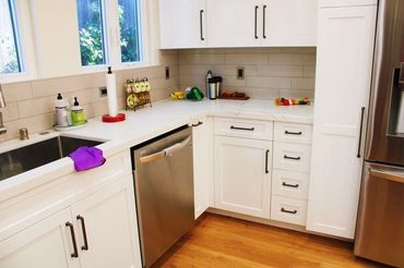 Small kitchen remodel los angeles, white quartz counters, modern black fixtures, stainless steel