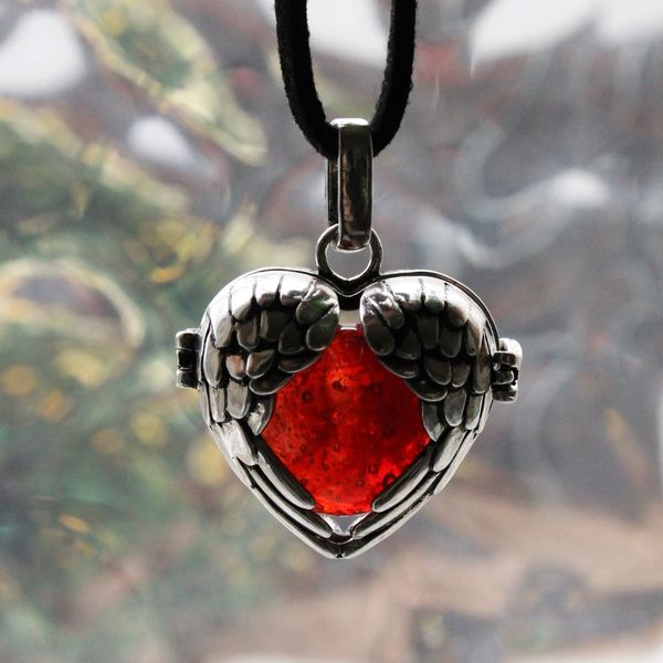 Heart, Silver Hand Pendant with Garnet