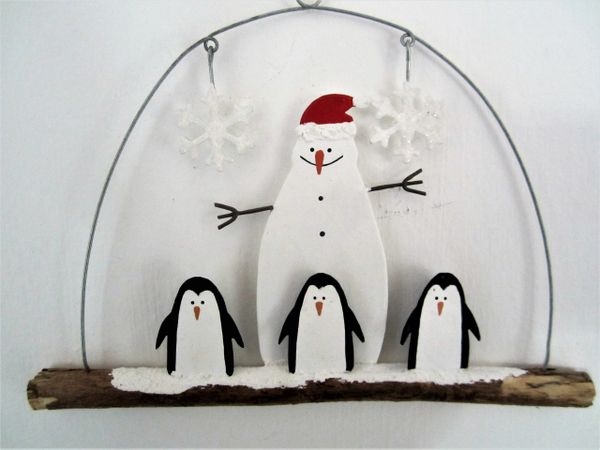 Three Penguins and Snowman on twig