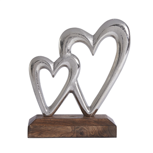 Silvered metal interlocked hearts on wooden base