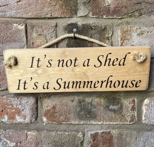 It's not a shed it's a summer house sign