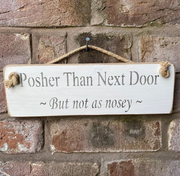 Posher Than Next Door Sign