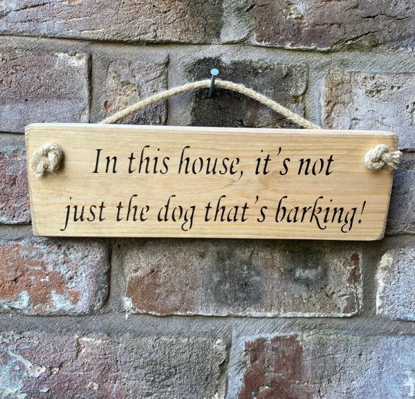 In this house, it's not just the dog... Sign