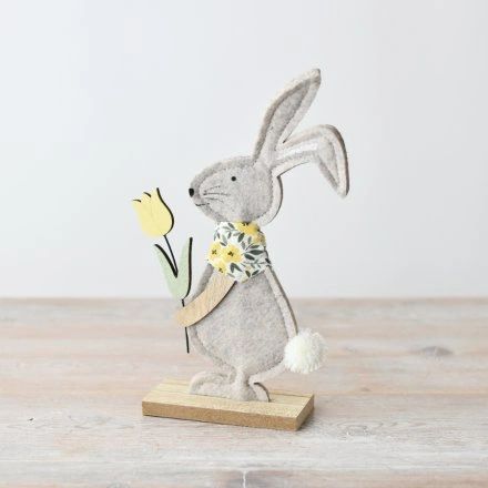 BUNNY WITH FLOWER ON WOODEN BASE, 23CM