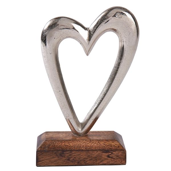 Silver metal heart on wooden base