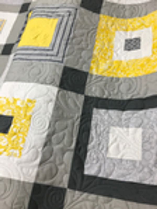 Edge to edge longarm quilting services.