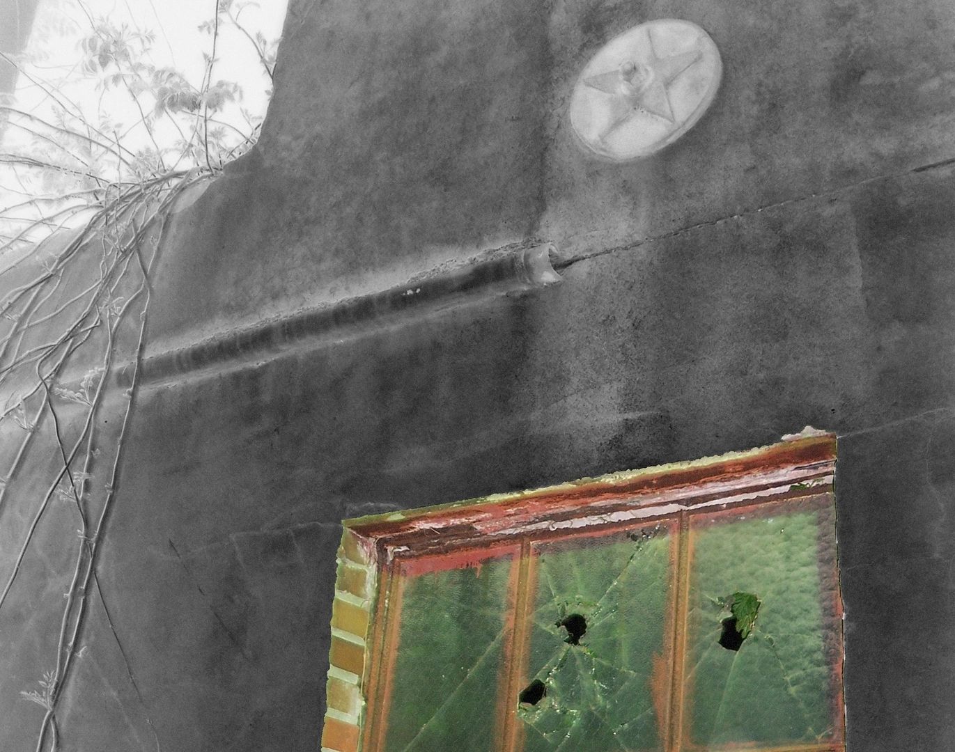 broken window in haunted house from ghost tour