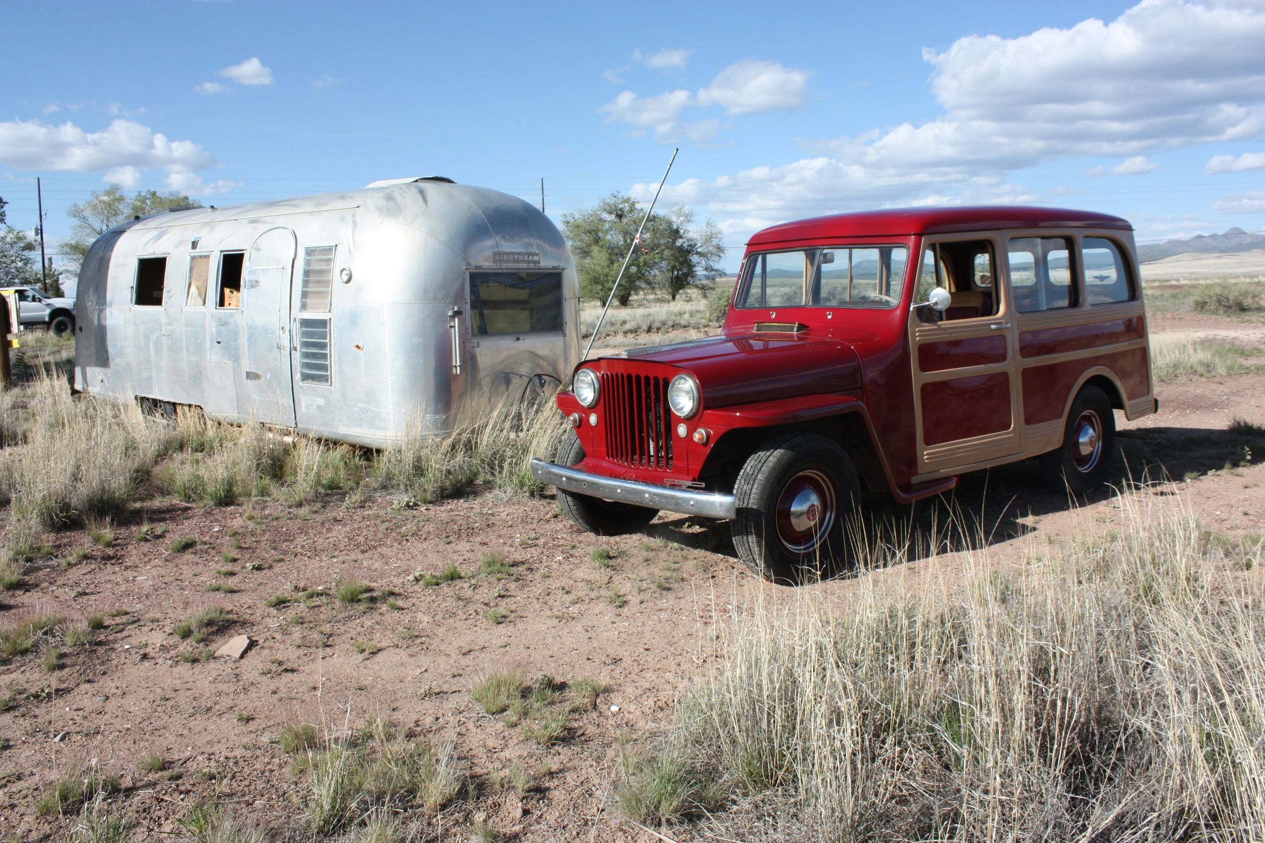 Route 66 trip. 1946 Willys Wagon and vintage Airstream trailer on historic Route 66 Seligman, Arizon