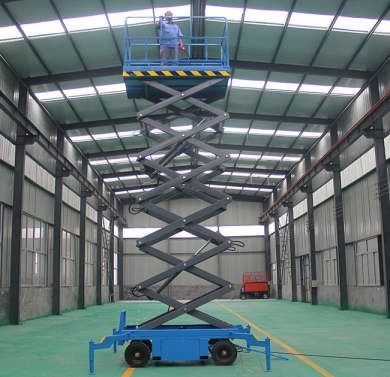 Mobile scissor lift 14 meters 500 KG 4 Batteries, Overload Alarm, Solid Tire, Tilt Alarm, Walk Assist -Forward Reverse, Pull Out Support Legs