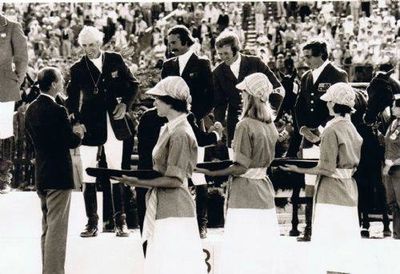 Merv Bennett (3rd from left) receiving his Olympic medal