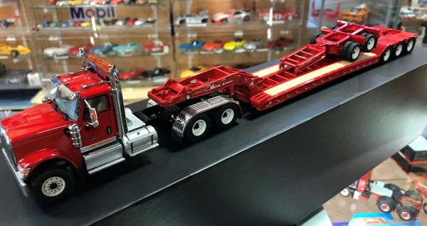 International HX520 Tractor with XL 120 Tri-axle trailer with 2 trailing  jeeps available in White, Black and Red 1:50 scale DM