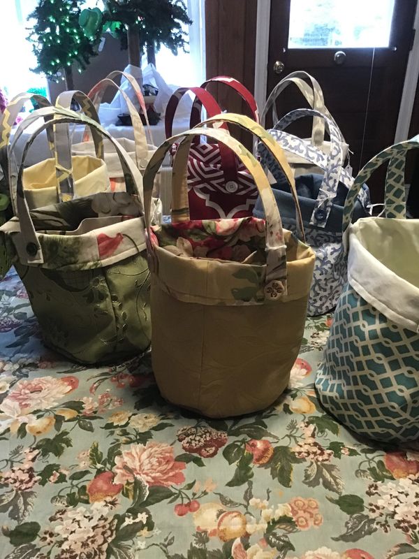Three sizes available of the exclusive Knitters Magic bucket bags.  Also a variety of reversible pro
