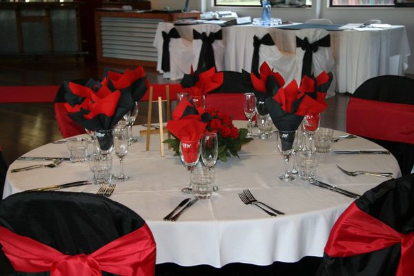 Premium Photo  Guests table setting for banquet in black red and