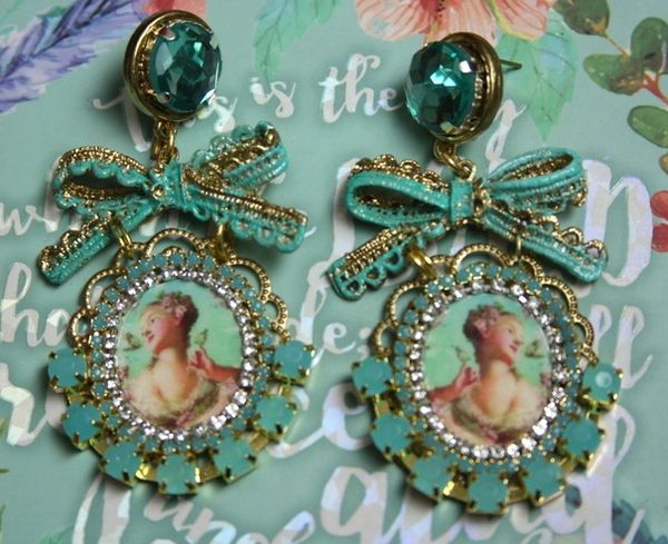 SOLD! 2049 Young Marie Antoinette Aqua Crystal Bow Studs