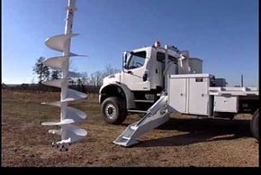 A white truck on the road